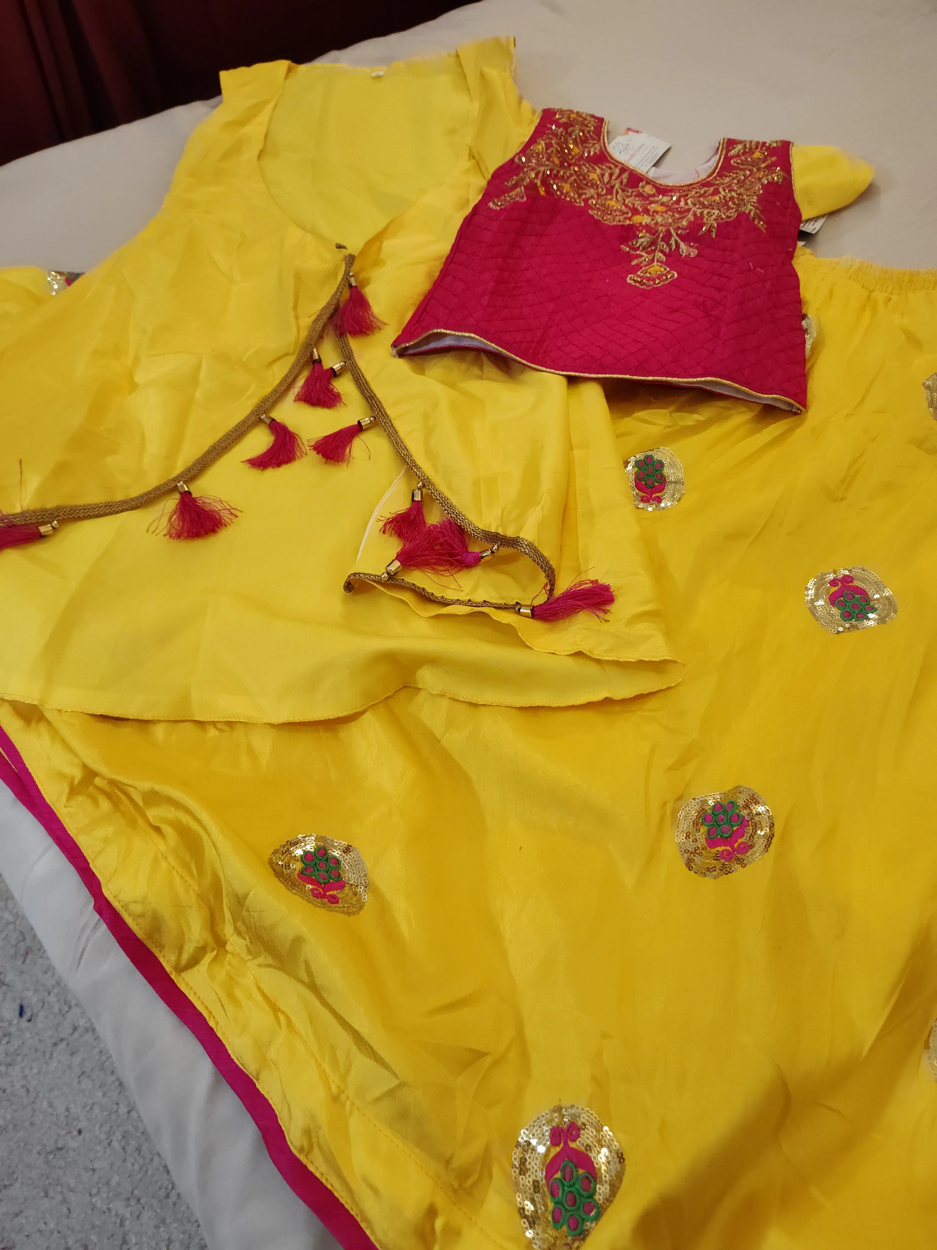 Beautiful Yellow And Pink Lehenga Set With Overcoat