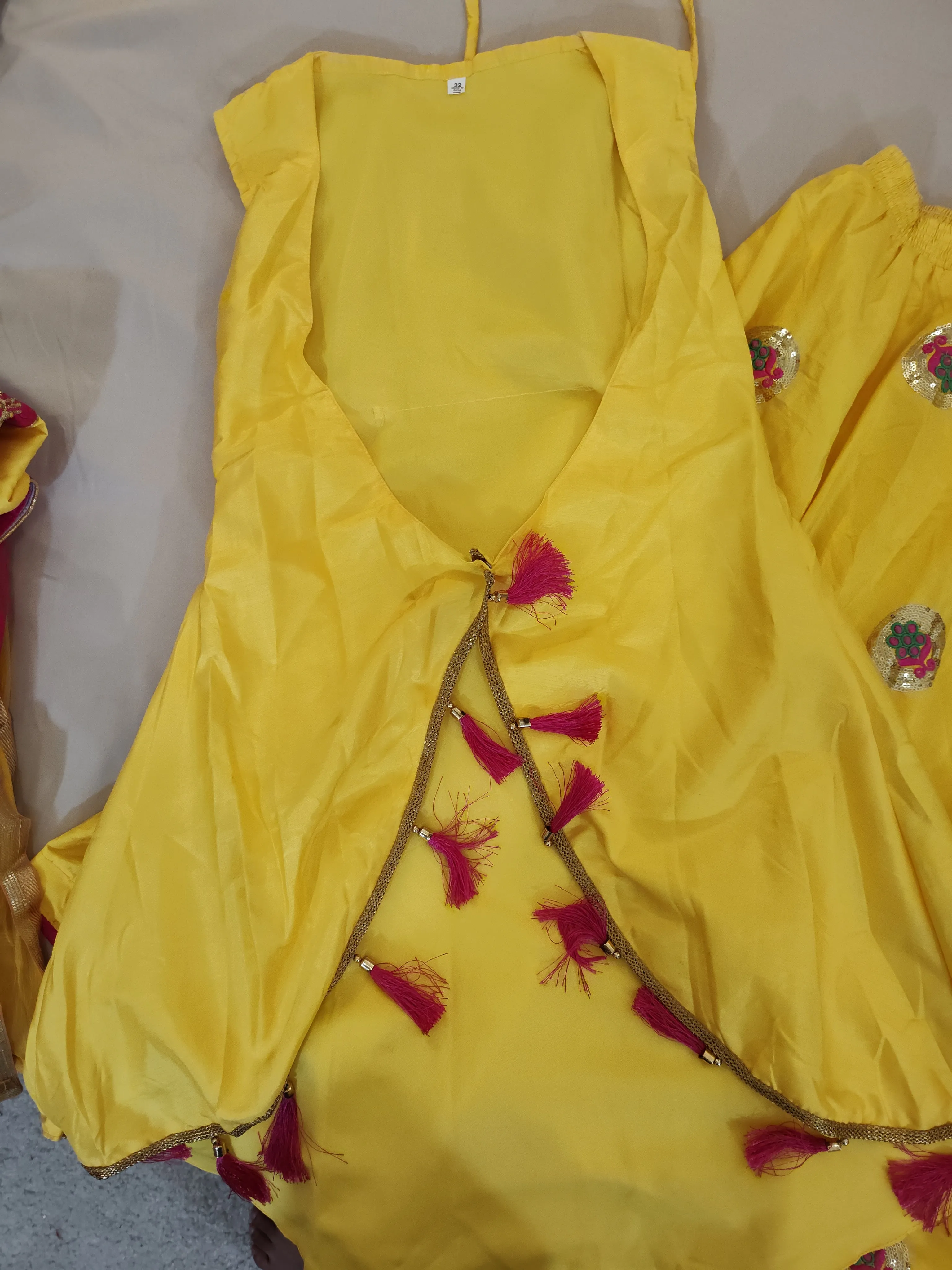 Beautiful Yellow And Pink Lehenga Set With Overcoat