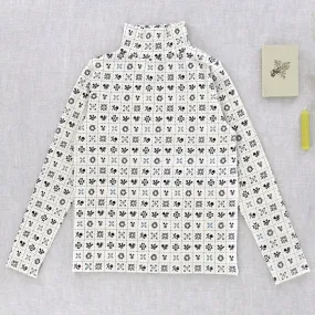 Snap Turtleneck in Cream Folk Quilt by Iver & Isla